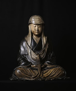 Image d'une sculpture de méditant