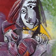 Portrait d'un adolescent par Pablo Picasso, peinture au traits noirs avec des aplats rouges, jaunes et verts.